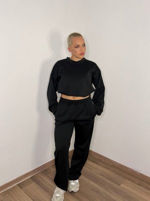 set pantalone a palazzo e felpa crop a palloncino